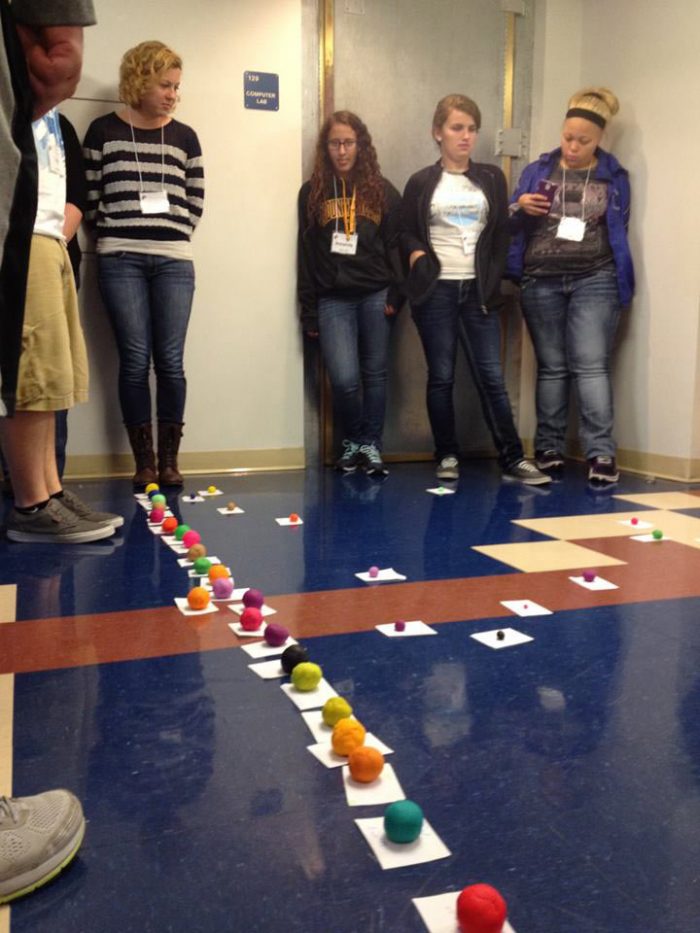 SPOT Ambassadors trying a hands-on activity to size up the Moon