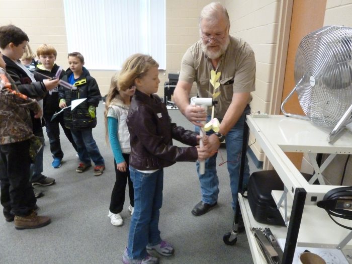 Testing windmill blades at the 2015 Science Fair.